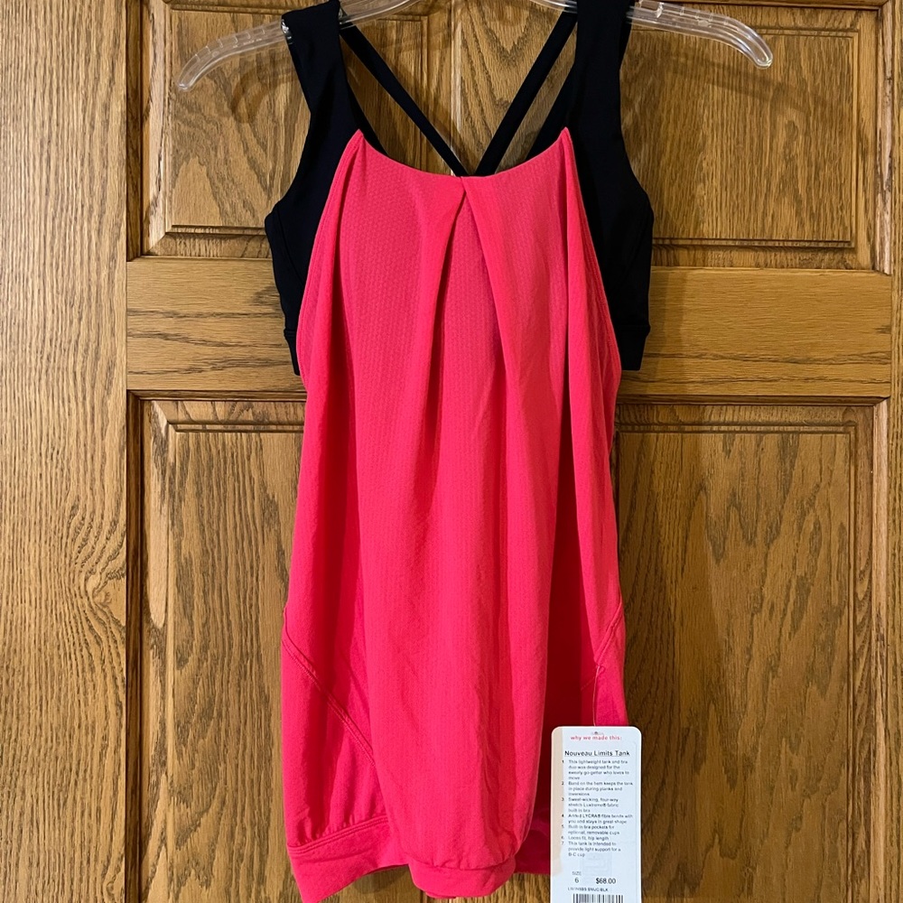 New with Tag. Lululemon tank size 6. Pink with black attached bra.